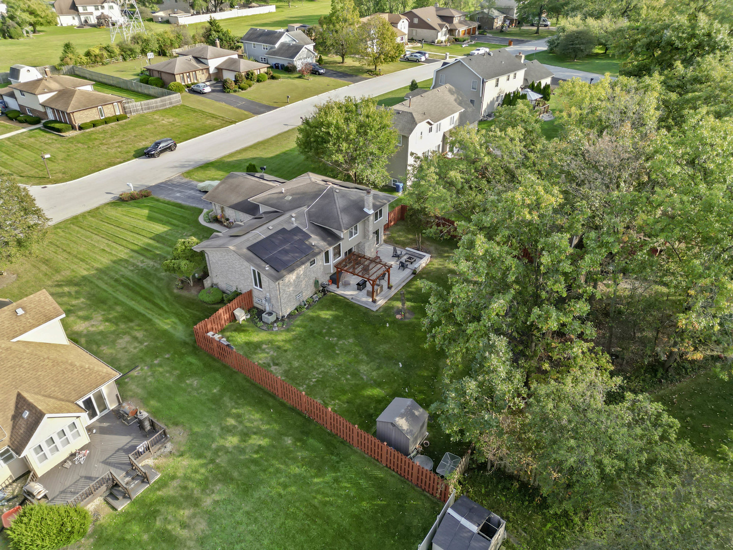 3686 Ronald Road Crete, IL 60417 - Photo 30 of 35 an aerial view of a house with a garden and lake view