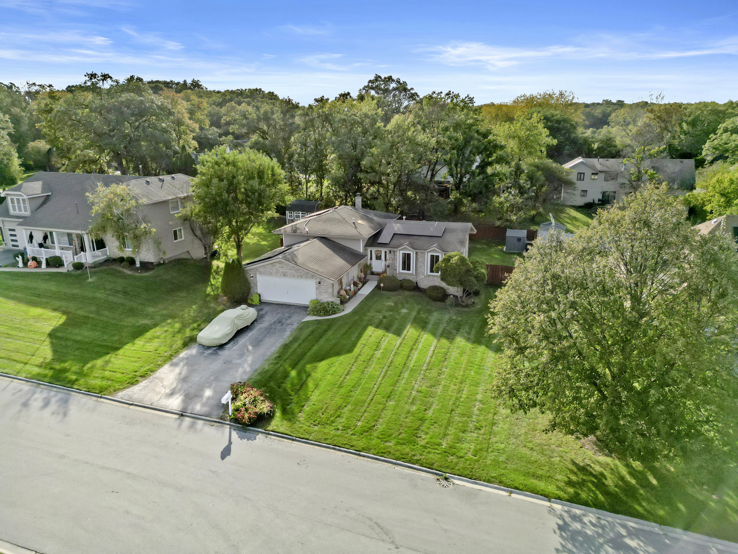 3686 Ronald Road Crete, IL 60417 - Photo 3 of 35 an aerial view of a house with a yard and lake view