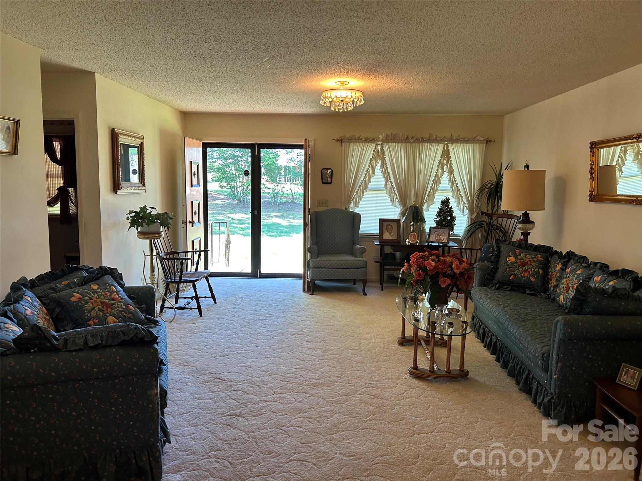 336 Bridges Road Blacksburg, SC 29702 - Photo 2 of 26 a living room with furniture and a large window