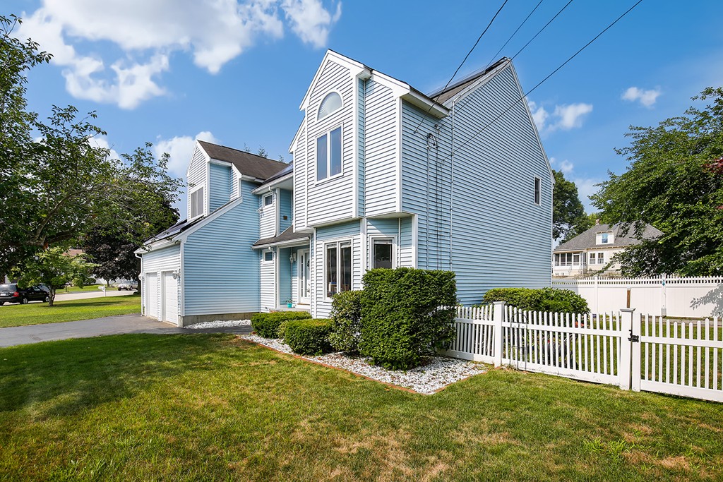 3 Jennifer Road Lowell, MA 01854 - Photo 1 of 25 a front view of a house with garden