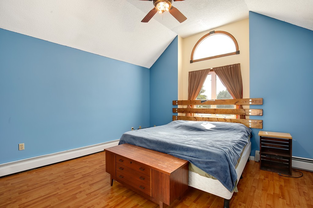 3 Jennifer Road Lowell, MA 01854 - Photo 13 of 25 a bedroom with a bed and a window