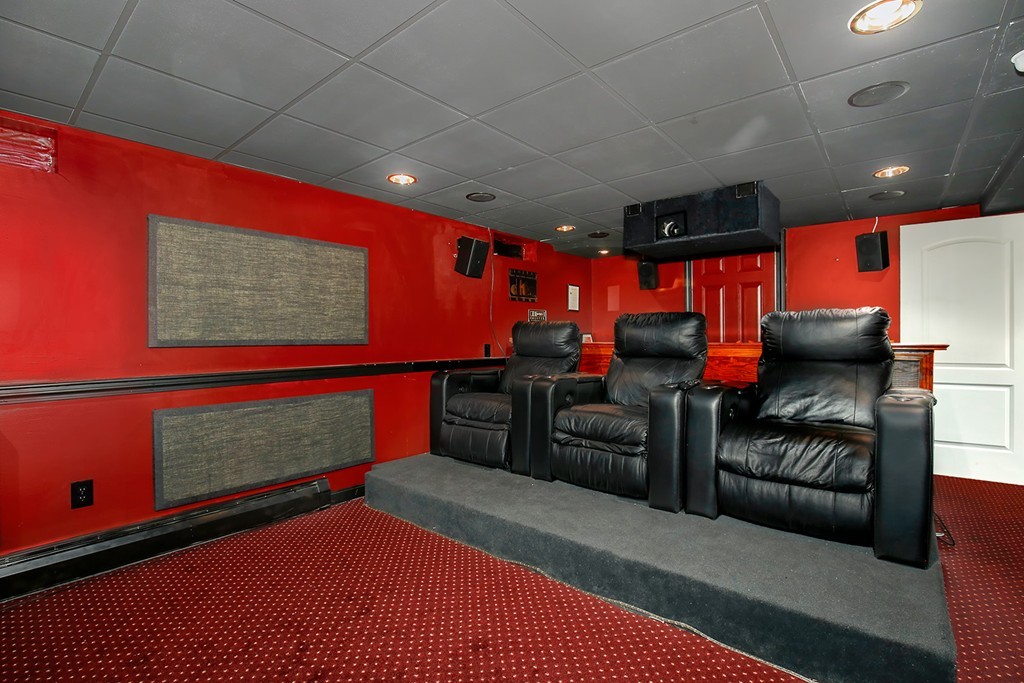3 Jennifer Road Lowell, MA 01854 - Photo 20 of 25 a projector room with furniture