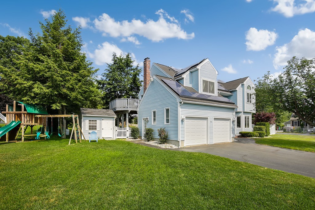 3 Jennifer Road Lowell, MA 01854 - Photo 2 of 25 a front view of house with yard and green space