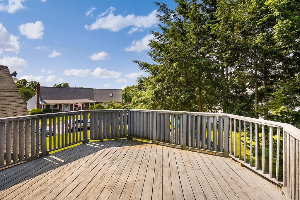 3 Jennifer Road Lowell, MA 01854 - Photo 23 of 25 a view of balcony with wooden floor