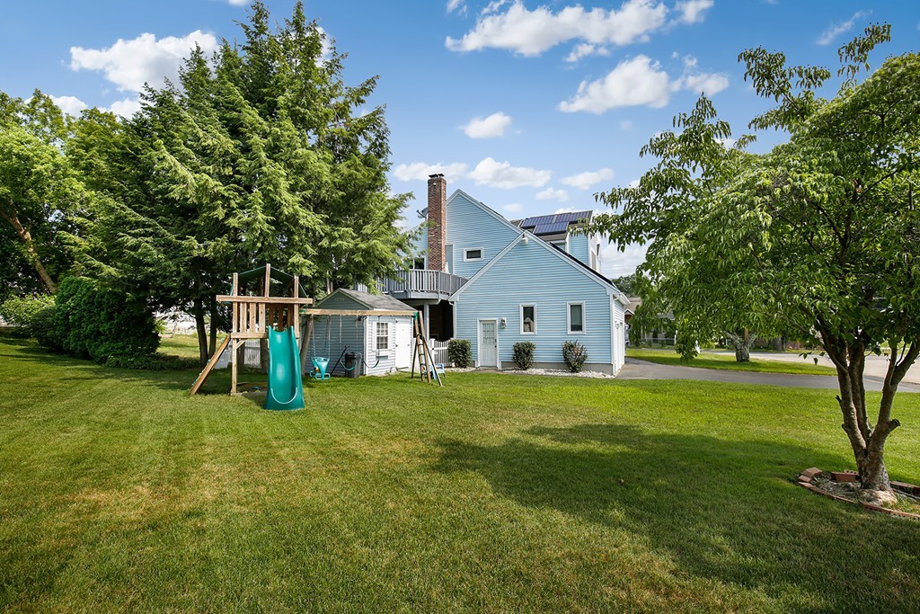 3 Jennifer Road Lowell, MA 01854 - Photo 24 of 25 a front view of house with yard and green space