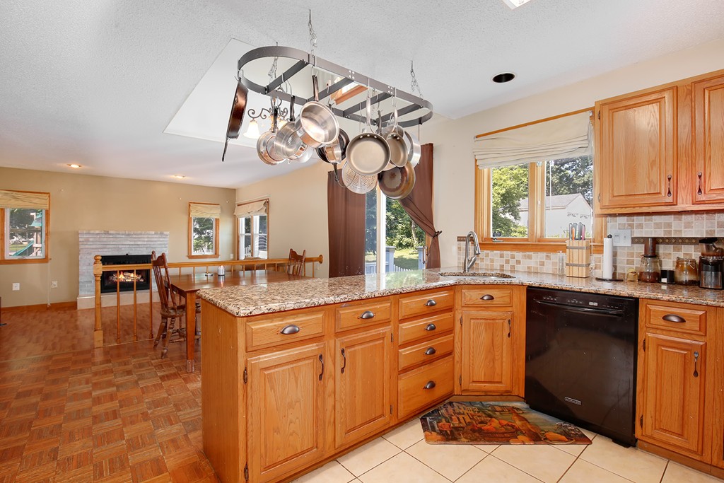 3 Jennifer Road Lowell, MA 01854 - Photo 4 of 25 a kitchen with a sink cabinets and window