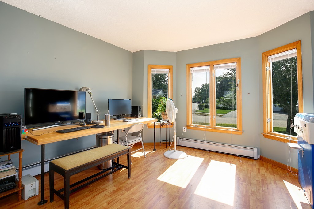 3 Jennifer Road Lowell, MA 01854 - Photo 7 of 25 a room with furniture and a flat screen tv