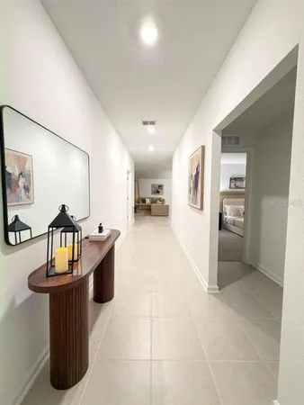 a lobby with furniture and window