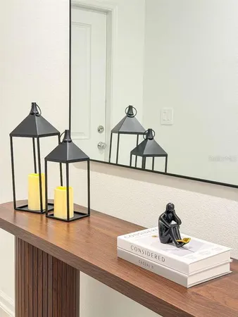 a view of a house with a window and furniture