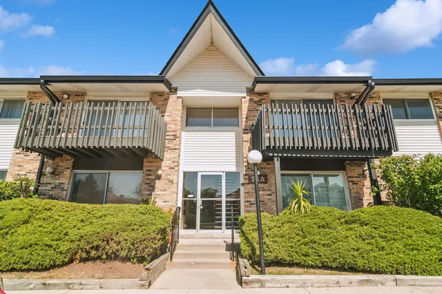 front view of a house with a garden