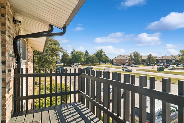 a utility room with cabinets washer and dryer