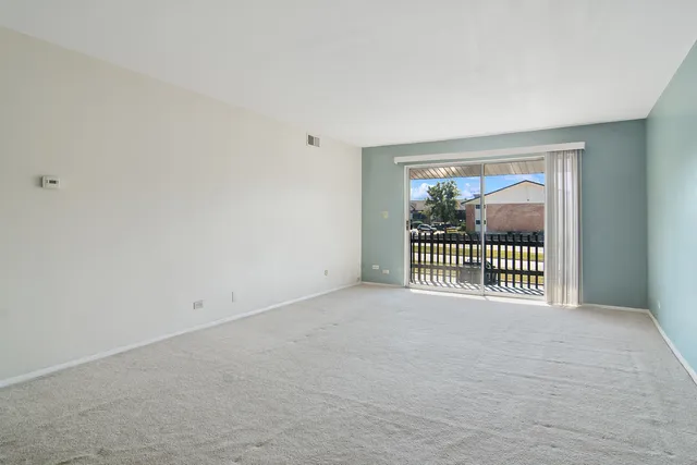a view of a livingroom with a large window