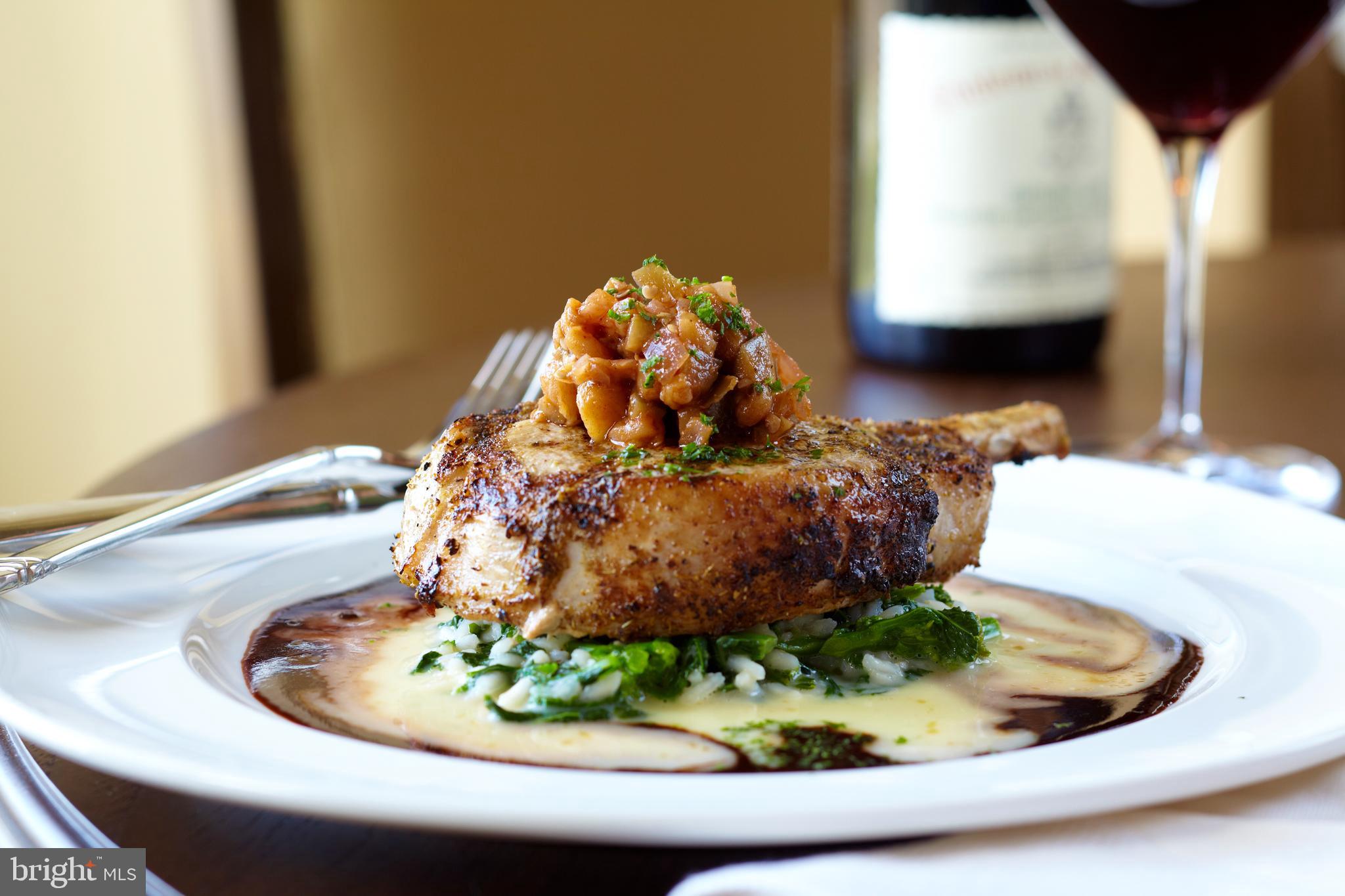 40174 Monroe Valley Place Aldie, VA 20105 - Photo 20 of 34 a vase of flowers sitting on a table