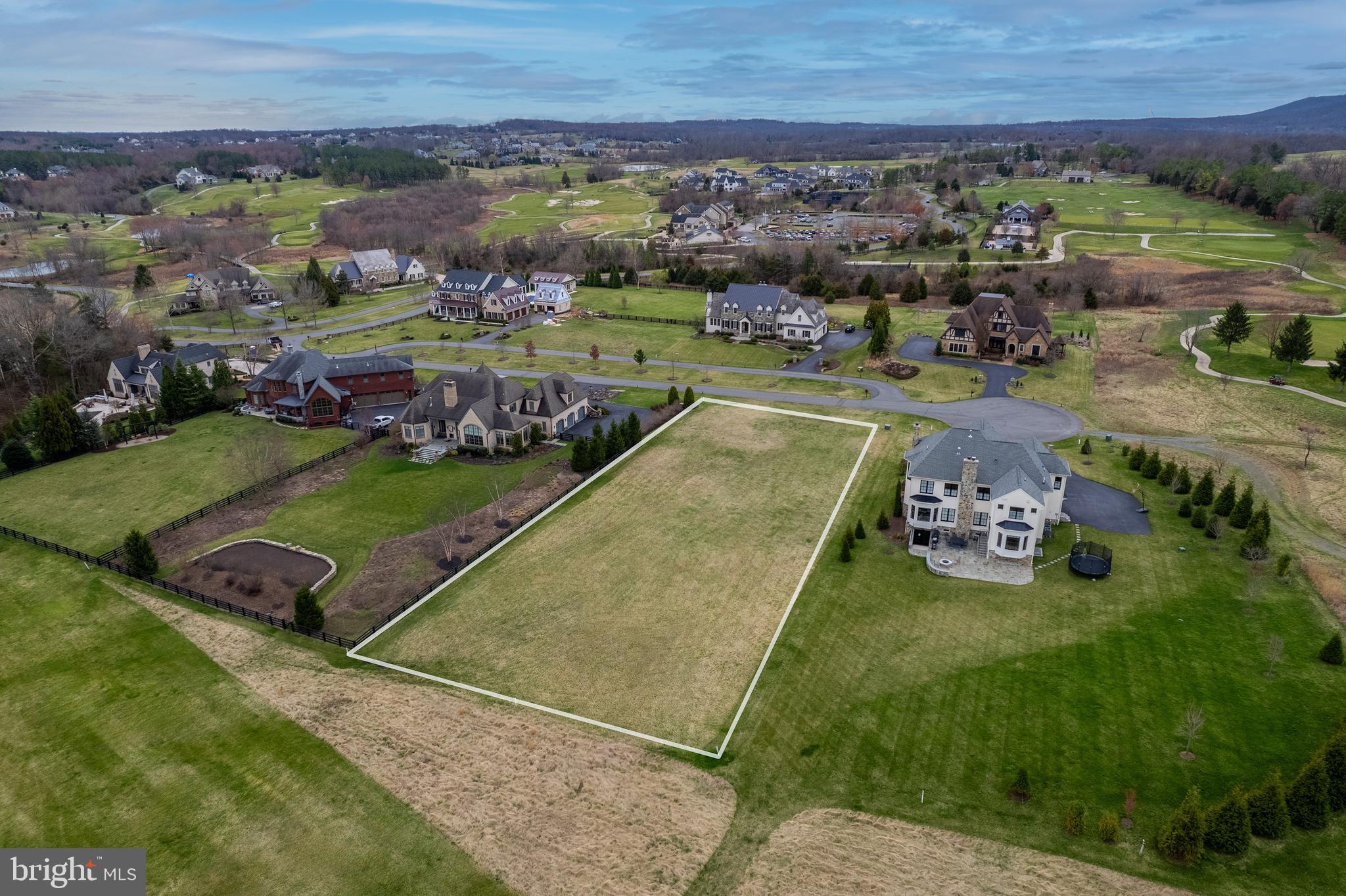 40174 Monroe Valley Place Aldie, VA 20105 - Photo 3 of 34 an aerial view of a house with a garden