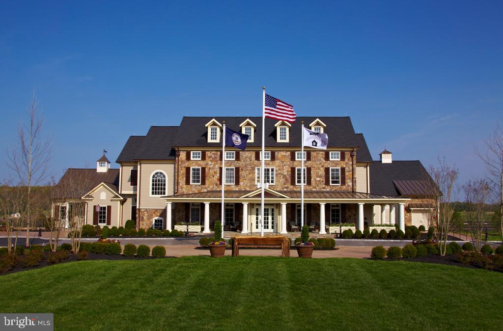 40174 Monroe Valley Place Aldie, VA 20105 - Photo 8 of 34 a front view of a building with a garden