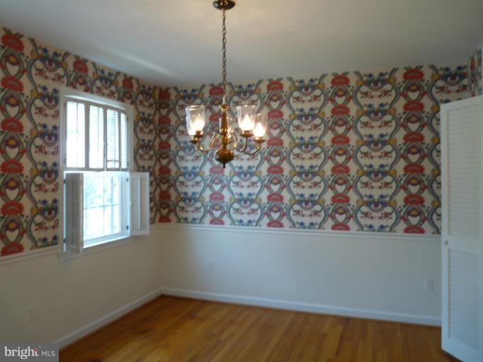 6754 Towne Lane Road McLean, VA 22101 - Photo 7 of 15 a view of empty room with window and chandelier fan