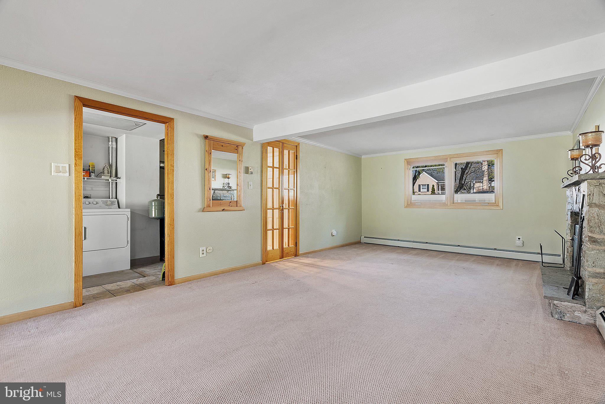 228 Rogers Road Norristown, PA 19403 - Photo 29 of 39 Family Room with walk-out to enclosed porch