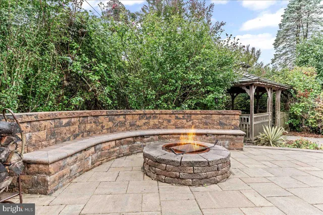 a view of a patio with table and chairs barbeque with wooden floor