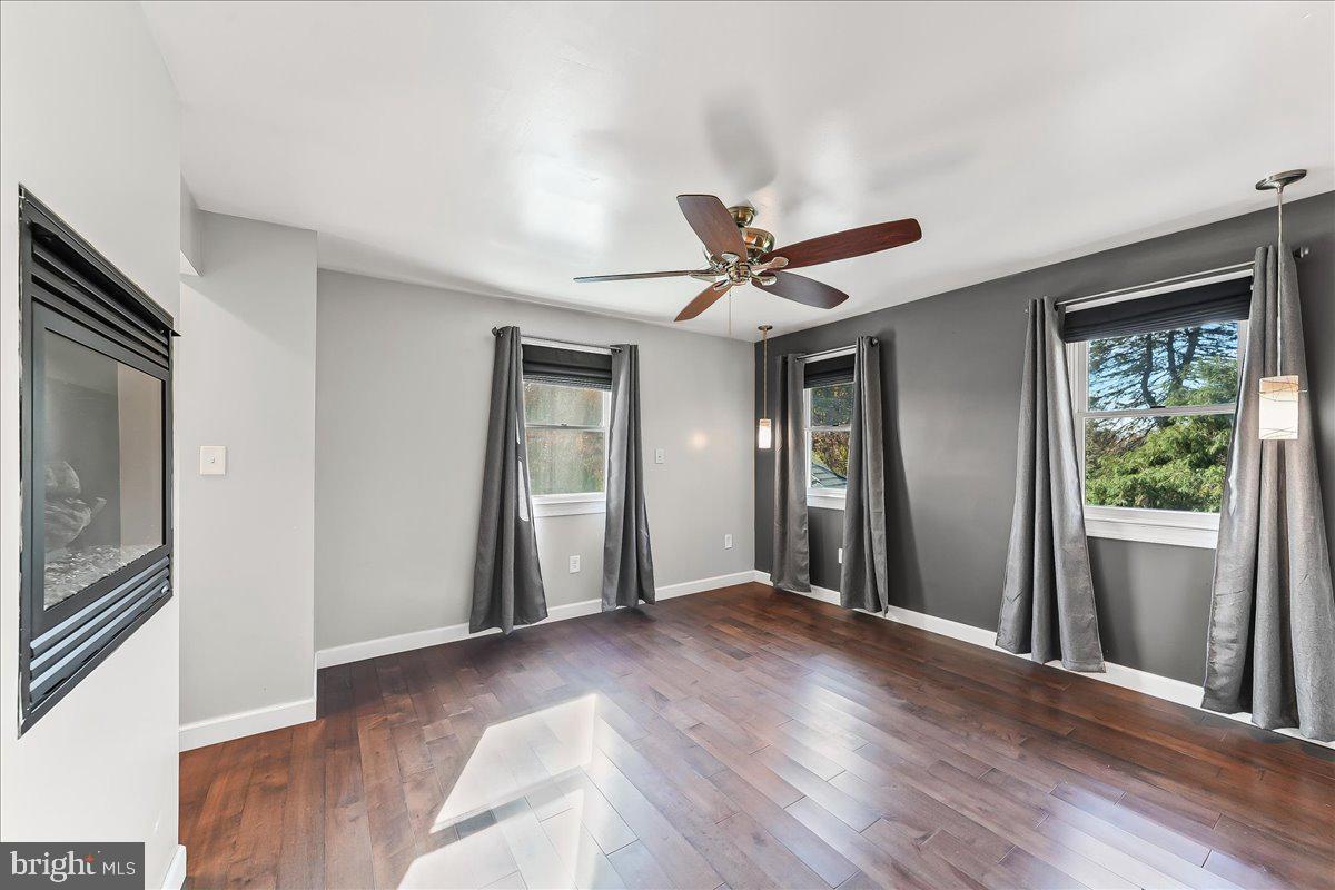 756 Ewing Road Cochranville, PA 19330 - Photo 55 of 73 a view of a livingroom with a ceiling fan and window