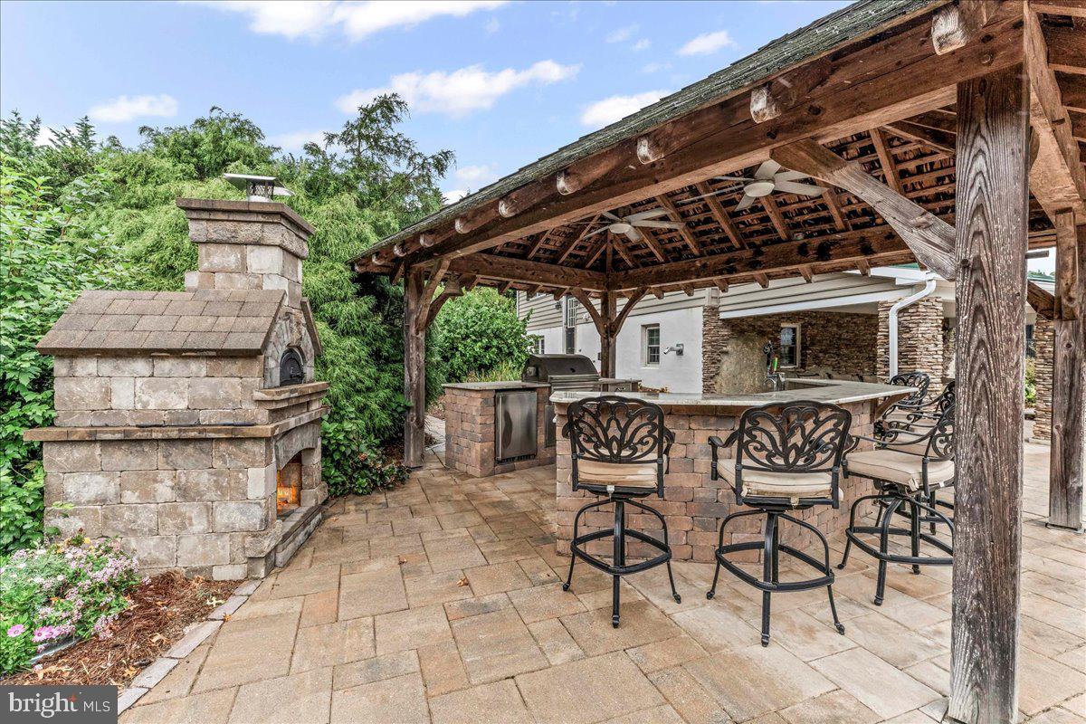 756 Ewing Road Cochranville, PA 19330 - Photo 6 of 73 a view of a chairs and table in the patio