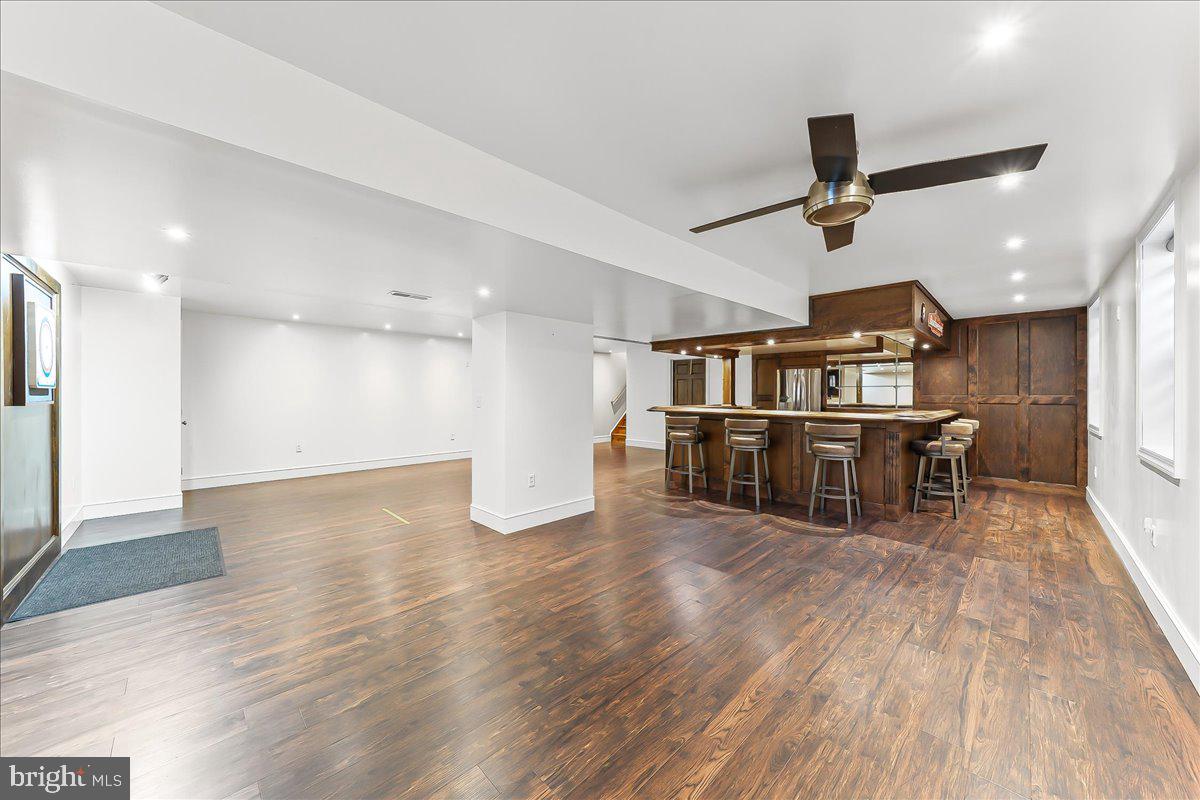 756 Ewing Road Cochranville, PA 19330 - Photo 67 of 73 a living room with furniture and a wooden floor
