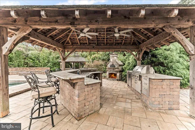 a pathway of a house with a yard