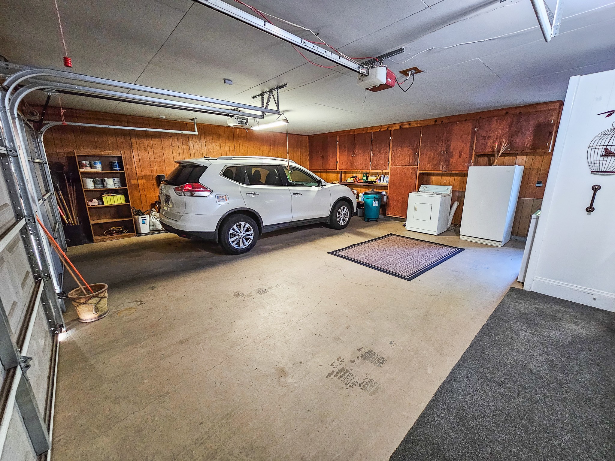 401 South Valley Road Shelbyville, TN 37160 - Photo 9 of 41 Good size garage for parking of 2 cars, room for the washer, dryer, freezer, hot water heater, and storage. Lots of cabinets for storage also.