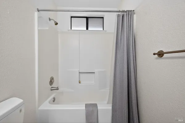 a bathroom with a bathtub