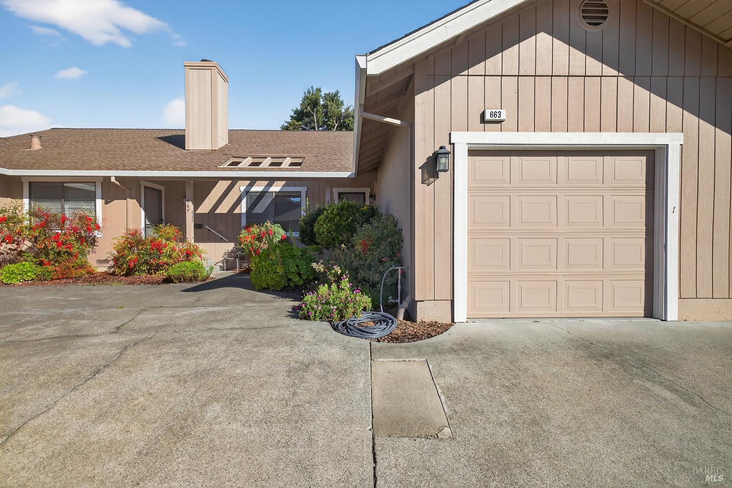 663 Spring Lane Sonoma, CA 95476 - Photo 4 of 24 a front view of a house with garden