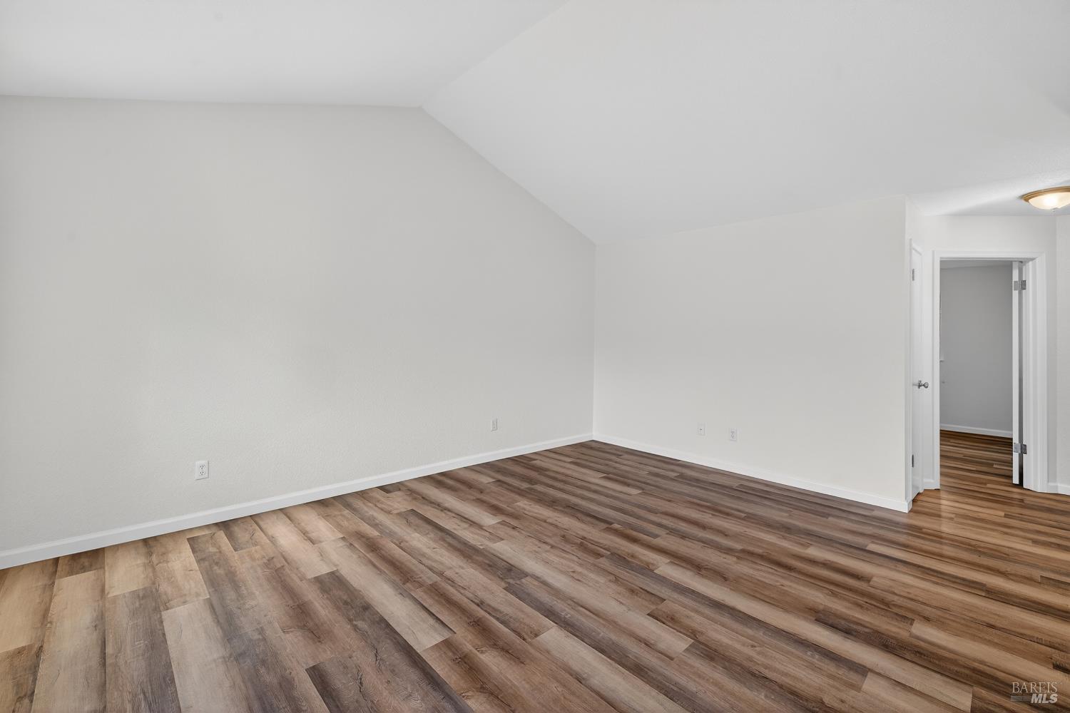 663 Spring Lane Sonoma, CA 95476 - Photo 8 of 24 a view of empty room with wooden floor