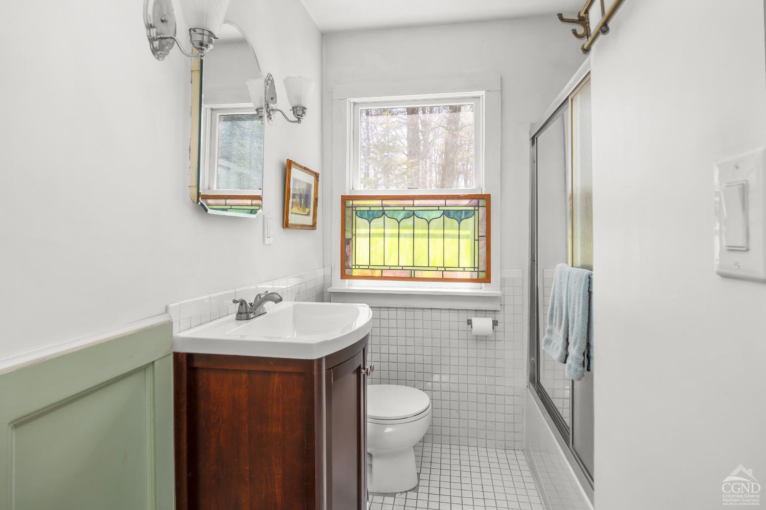 1235 Ira Vail Road Leeds, NY 12451 - Photo 16 of 35 a bathroom with a sink toilet a mirror and shower
