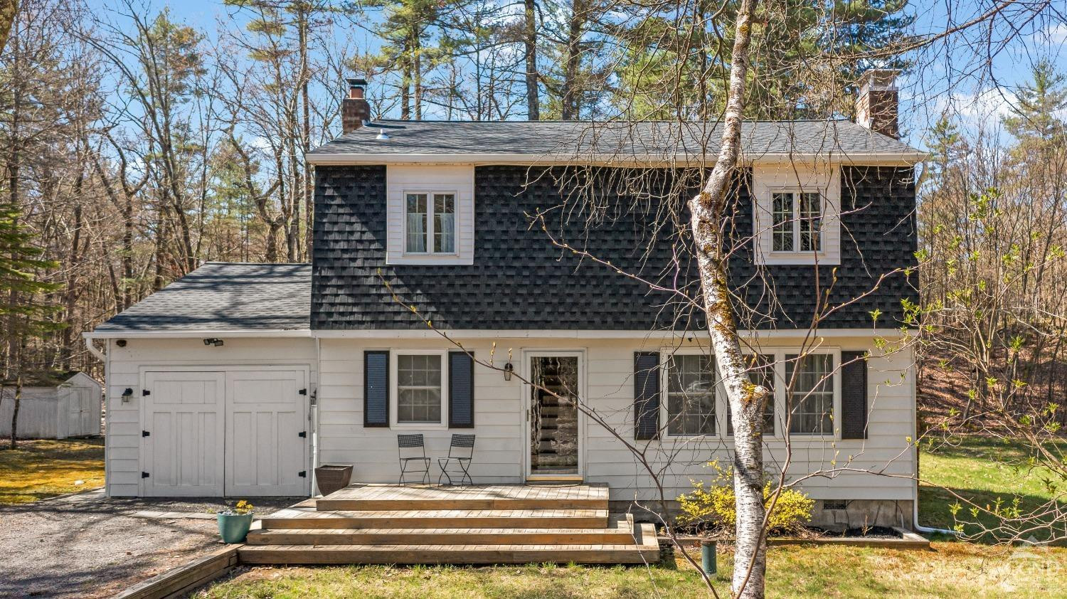 1235 Ira Vail Road Leeds, NY 12451 - Photo 2 of 35 a front view of a house with a garden