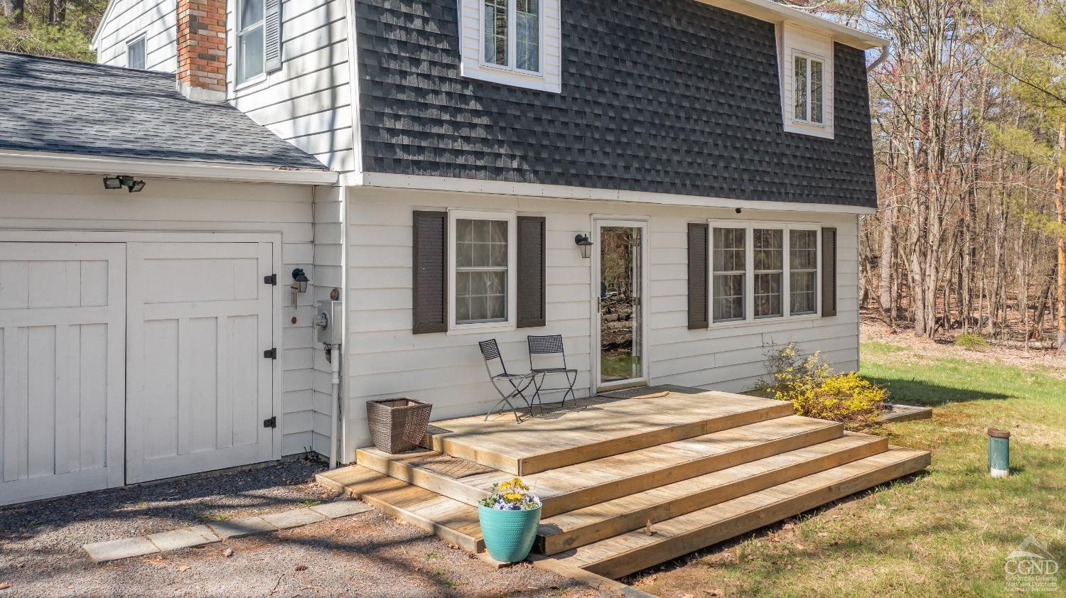 1235 Ira Vail Road Leeds, NY 12451 - Photo 21 of 35 a view of a house with backyard and sitting area