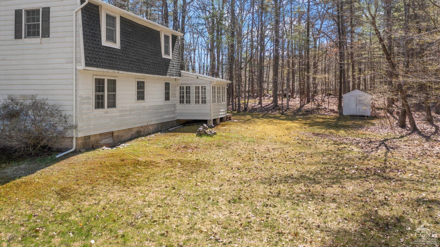 1235 Ira Vail Road Leeds, NY 12451 - Photo 23 of 35 a backyard of a house with table and chairs