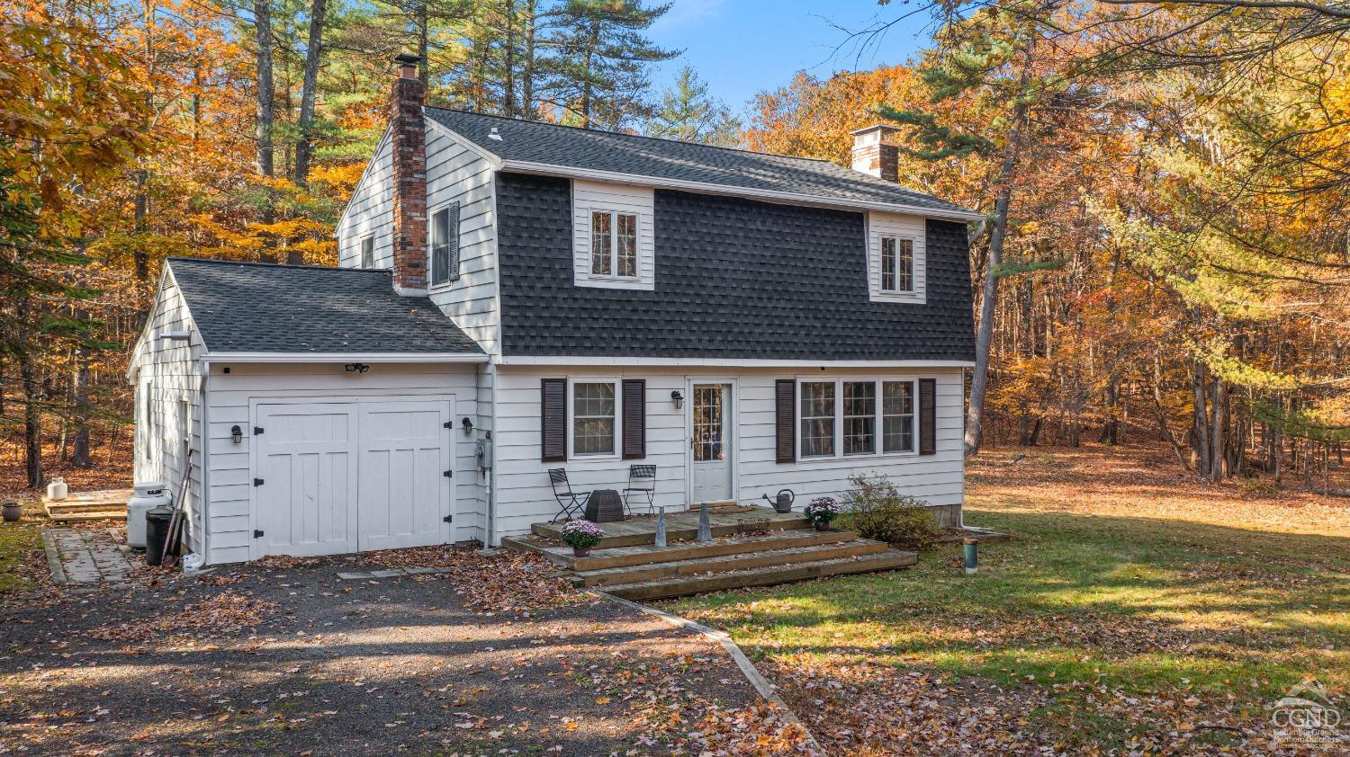 1235 Ira Vail Road Leeds, NY 12451 - Photo 27 of 35 a front view of a house with a yard and garage