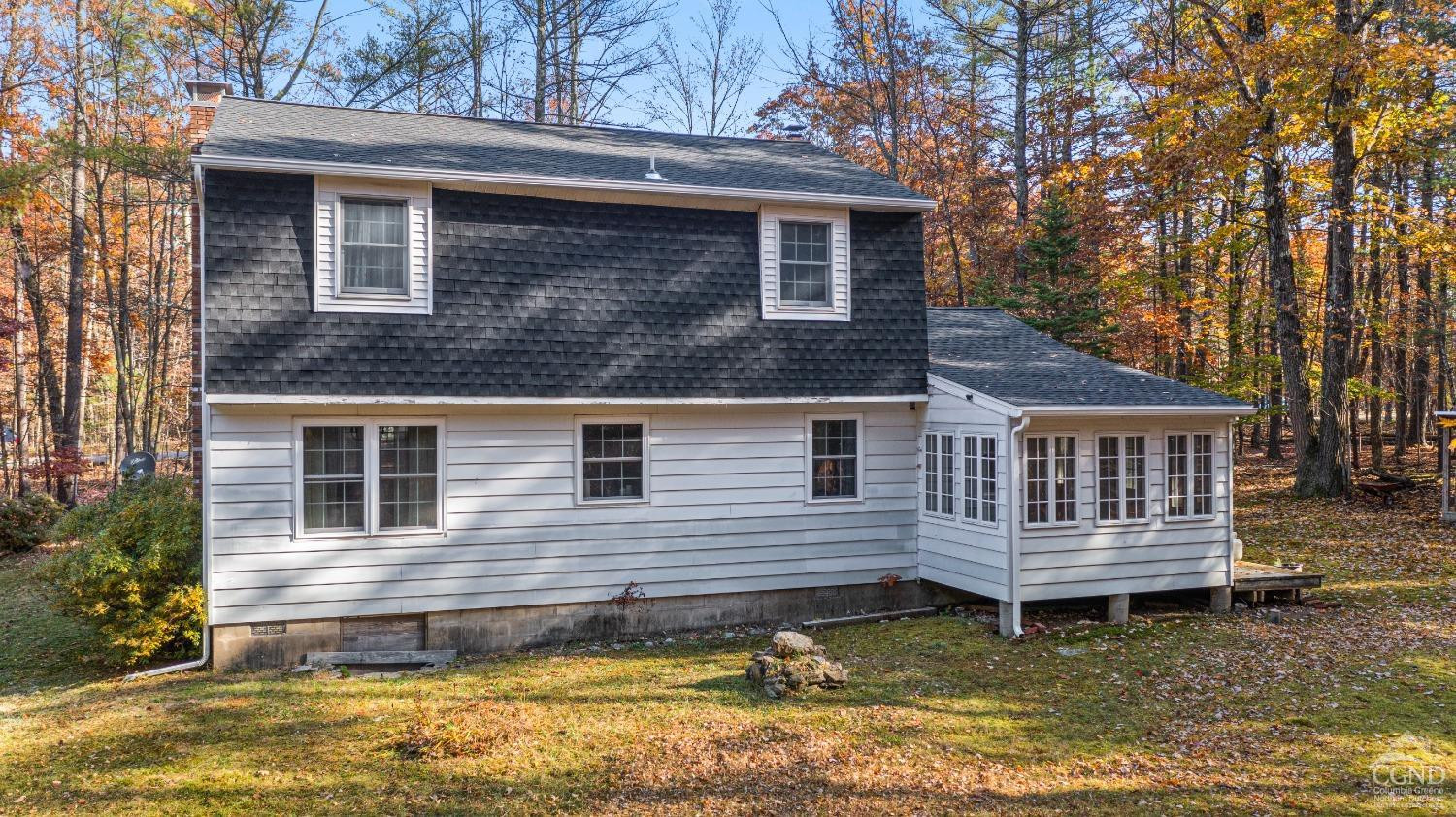 1235 Ira Vail Road Leeds, NY 12451 - Photo 29 of 35 a view of a house with a small yard and a large tree