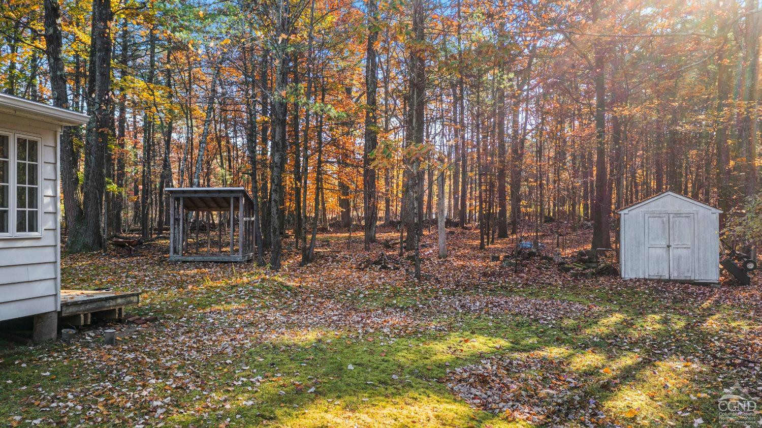 1235 Ira Vail Road Leeds, NY 12451 - Photo 30 of 35 a view of a house with a yard and sitting area