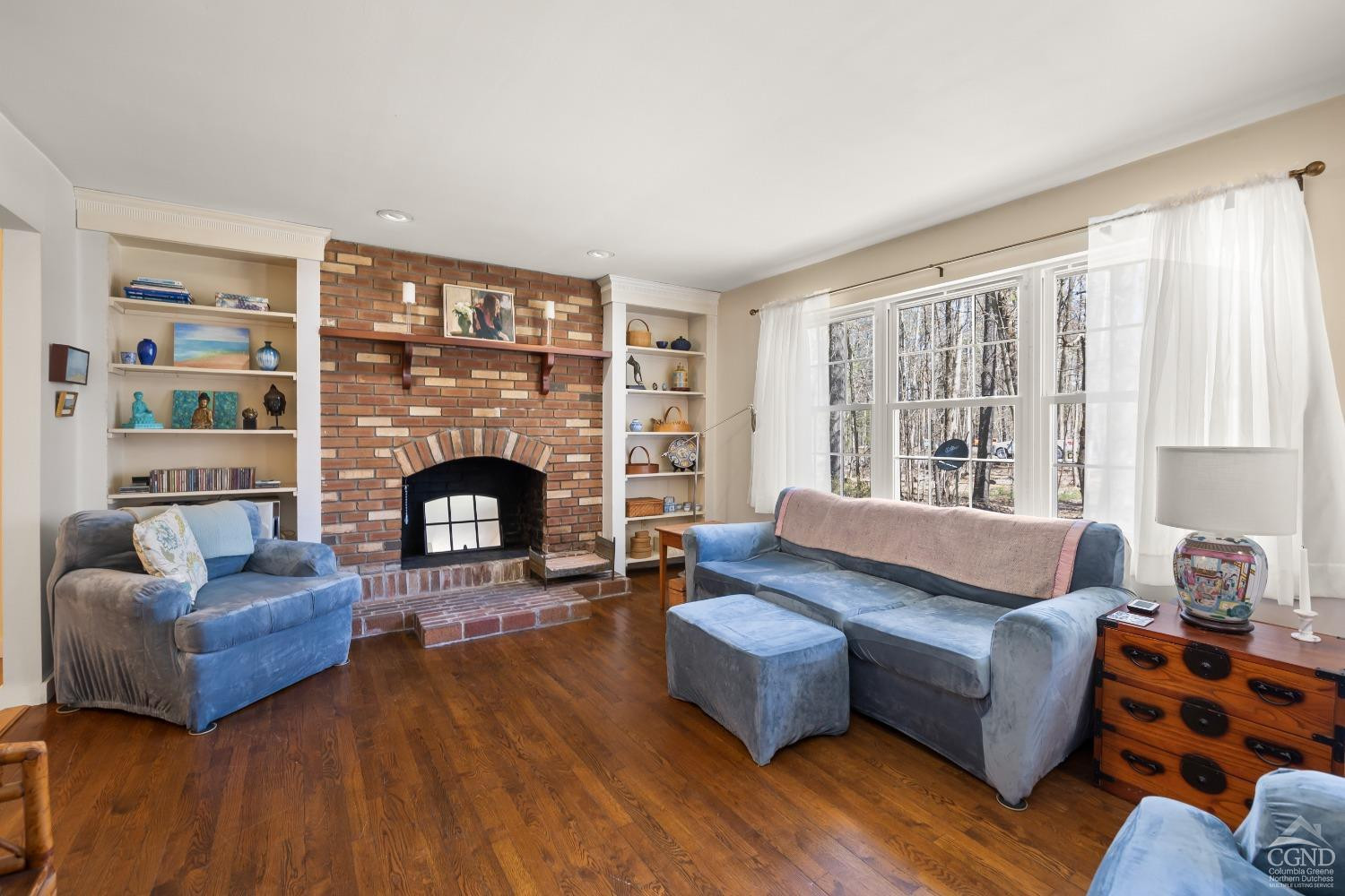 1235 Ira Vail Road Leeds, NY 12451 - Photo 4 of 35 a living room with furniture and a fireplace