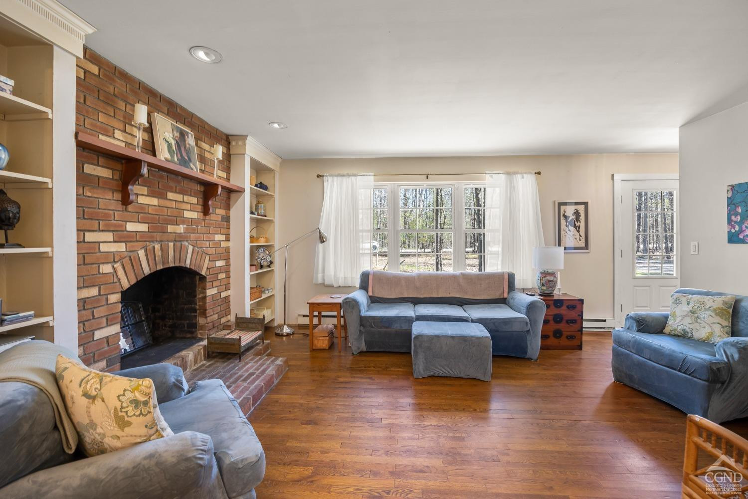 1235 Ira Vail Road Leeds, NY 12451 - Photo 5 of 35 a living room with furniture and a fireplace
