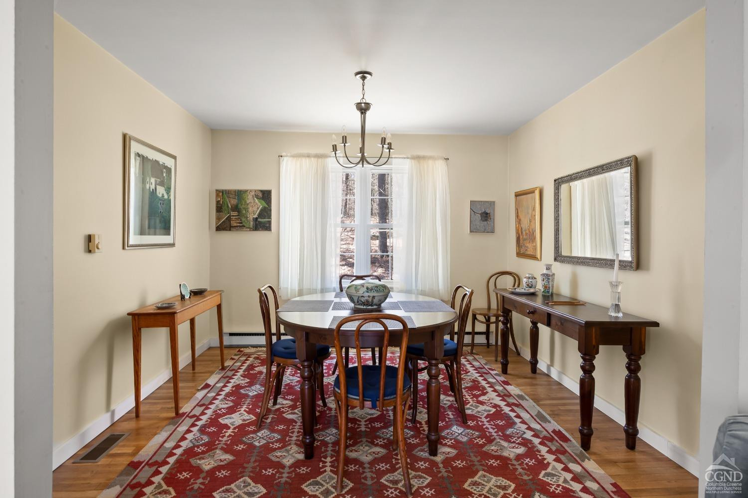1235 Ira Vail Road Leeds, NY 12451 - Photo 7 of 35 a view of a a dining room with furniture window and wooden floor