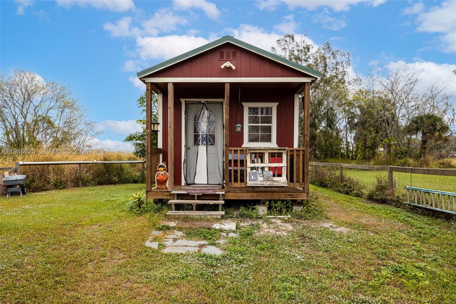 2915 Ortona Locks Road Moore Haven, FL 33471 - Photo 18 of 20 a view of a house with backyard