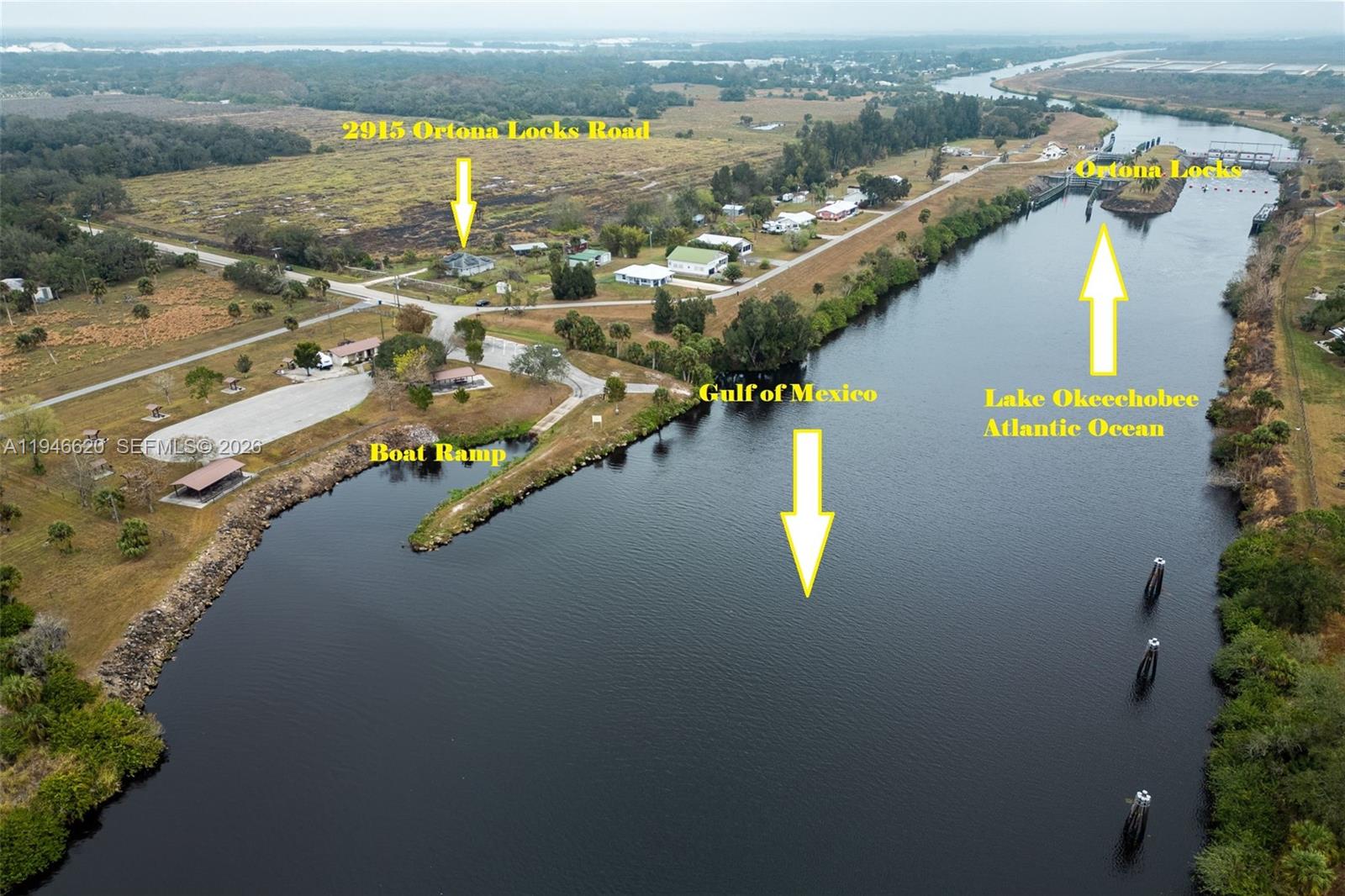 2915 Ortona Locks Road Moore Haven, FL 33471 - Photo 3 of 20 a view of city and swimming pool