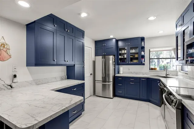 $299,900 | 3505 Tarpon Woods Boulevard, Unit I406, Palm Harbor, FL 34685