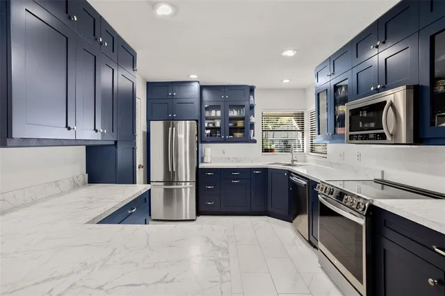 $299,900 | 3505 Tarpon Woods Boulevard, Unit I406, Palm Harbor, FL 34685