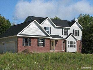 816 North Hughes Road Howell, MI 48843 - Photo 1 of 1 FRONT