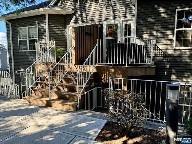 a view of a house with brick walls