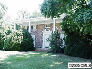 2901 Ferncliff Road Charlotte, NC 28211 - Photo 1 of 8 a front view of a house with a garden