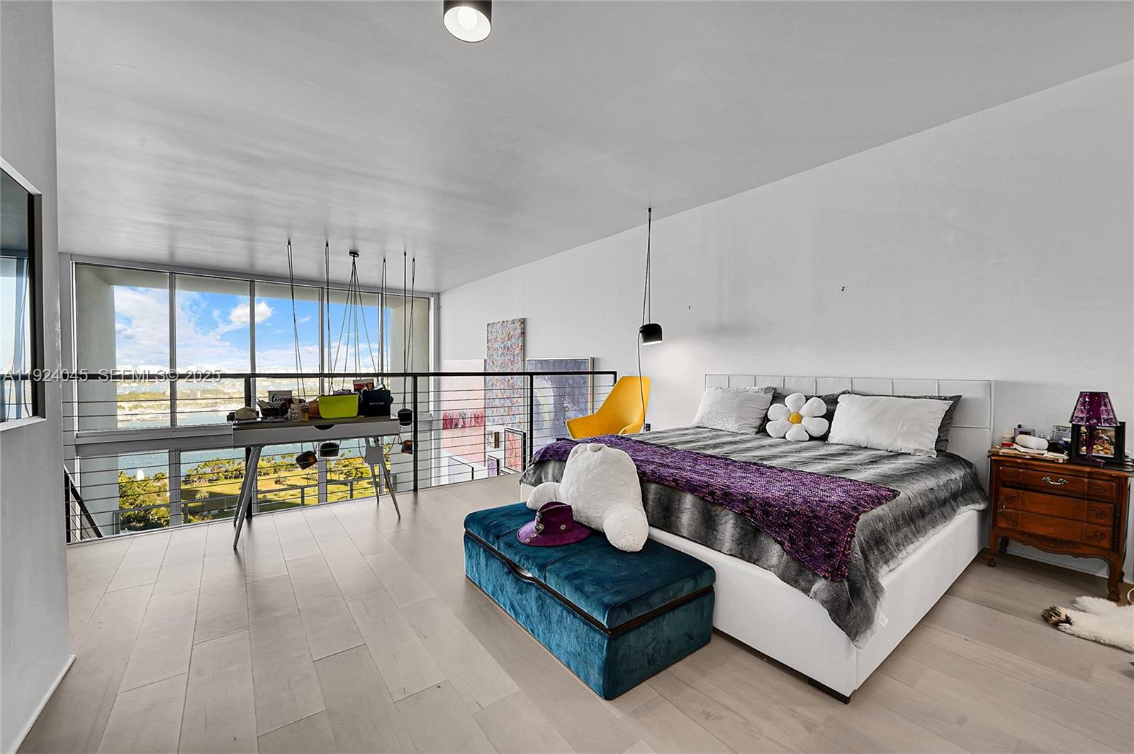 1040 Biscayne Boulevard, Unit 2603 Miami, FL 33132 - Photo 15 of 40 a living room with furniture and a table