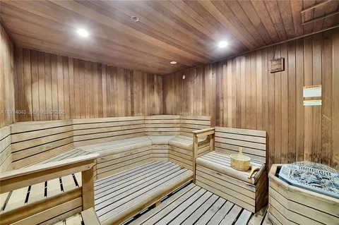 a view of a room with wooden walls