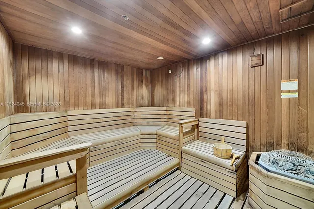 a view of a room with wooden walls